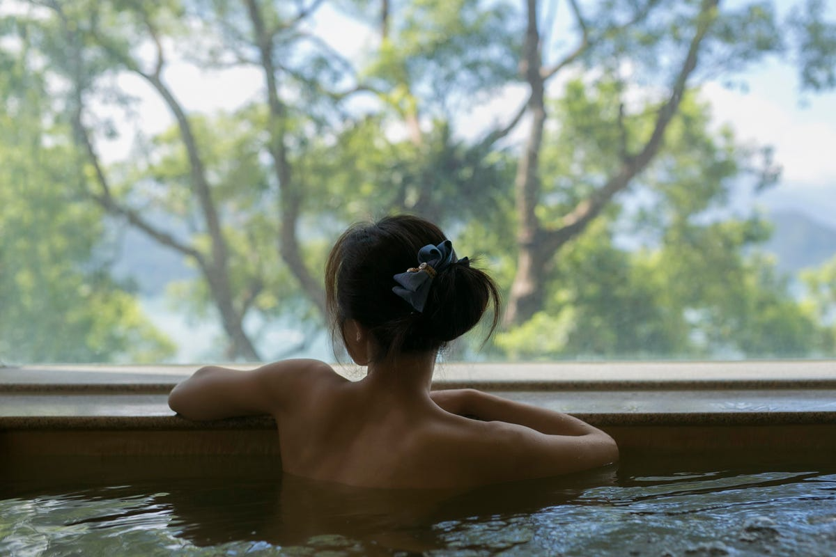 woman in the pool thumbnail for the article 7 Top Wellness Trends for Women in 2025: From Holistic Healing to Digital Detoxes