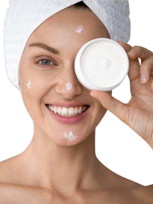 woman using face cream